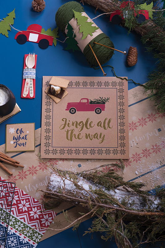 Christmas themed tablescape with jingle all the way card