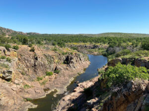 view of riving from the top of a hill