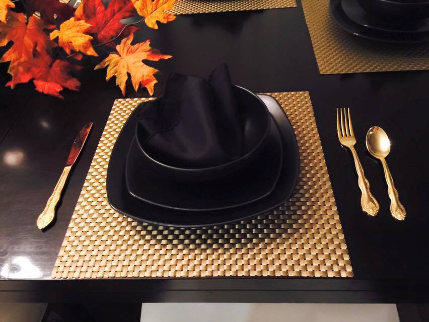 close up of black table setting