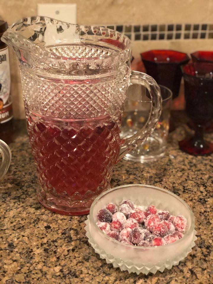 cranberry mule with bowl of sugared cranberries