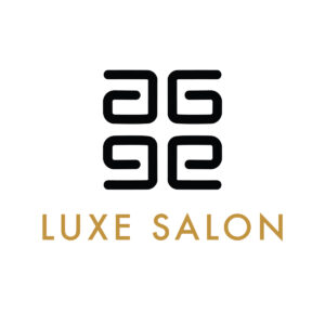 A sleek Modern Chic Salon Logo featuring interlocking geometric black shapes with luxurious gold lettering.