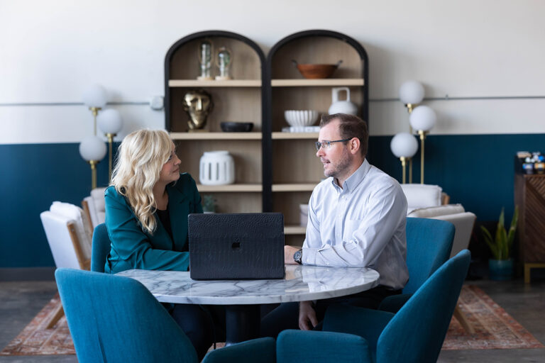 Crystal Oakes working with a client on a Marketing Roadmap Session, demonstrating Small Business Marketing Tips x4 for strategy and growth.