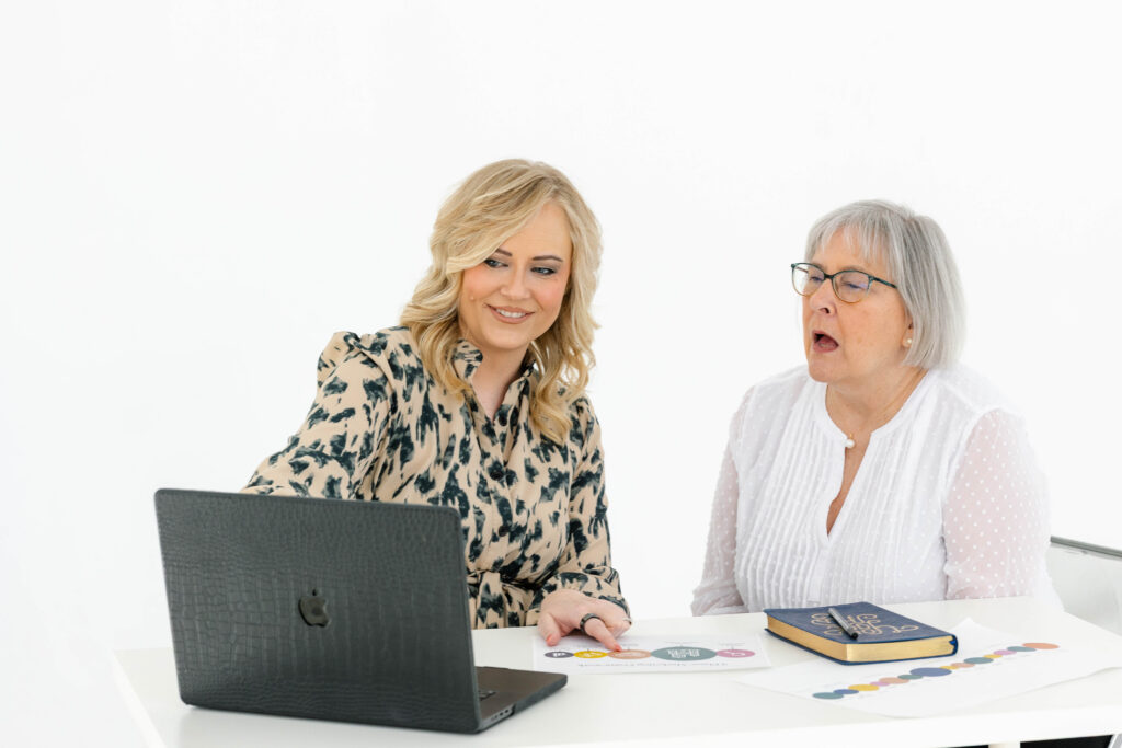 Marketing consultant guiding a client through a marketing roadmap to improve content consistency and refine their online growth strategy.